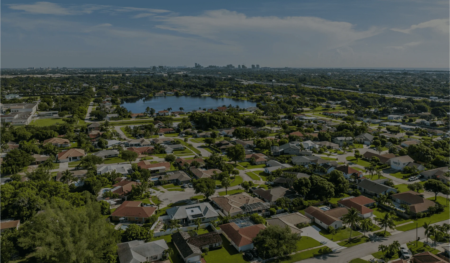 An image of West Palm Beach at dusk along the water.